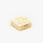 A Blondie Dessert Bar cut on a light grey background