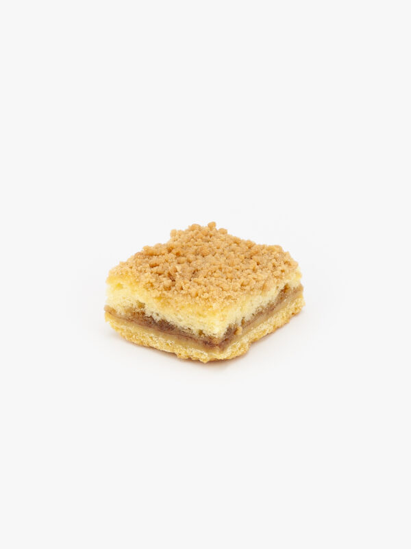 A Coffee Cake Dessert Bar cut on a light grey background