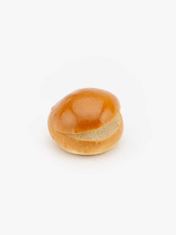 A 2" sliced brioche dinner roll