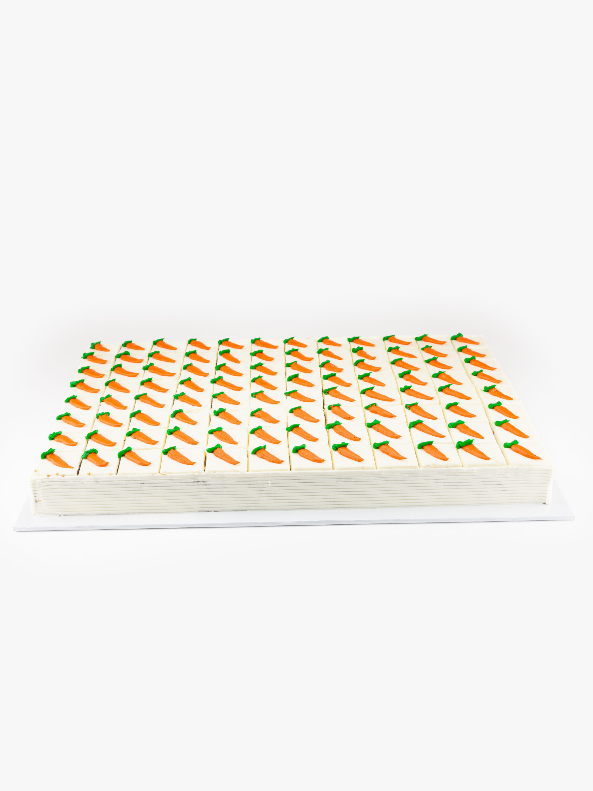 A Single Classic Full Sheet 96 Cut Carrot Cake on a light grey background