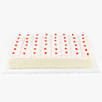 A Single Deluxe Half Sheet 48 Cut Strawberry Mousse Cake on a light grey background