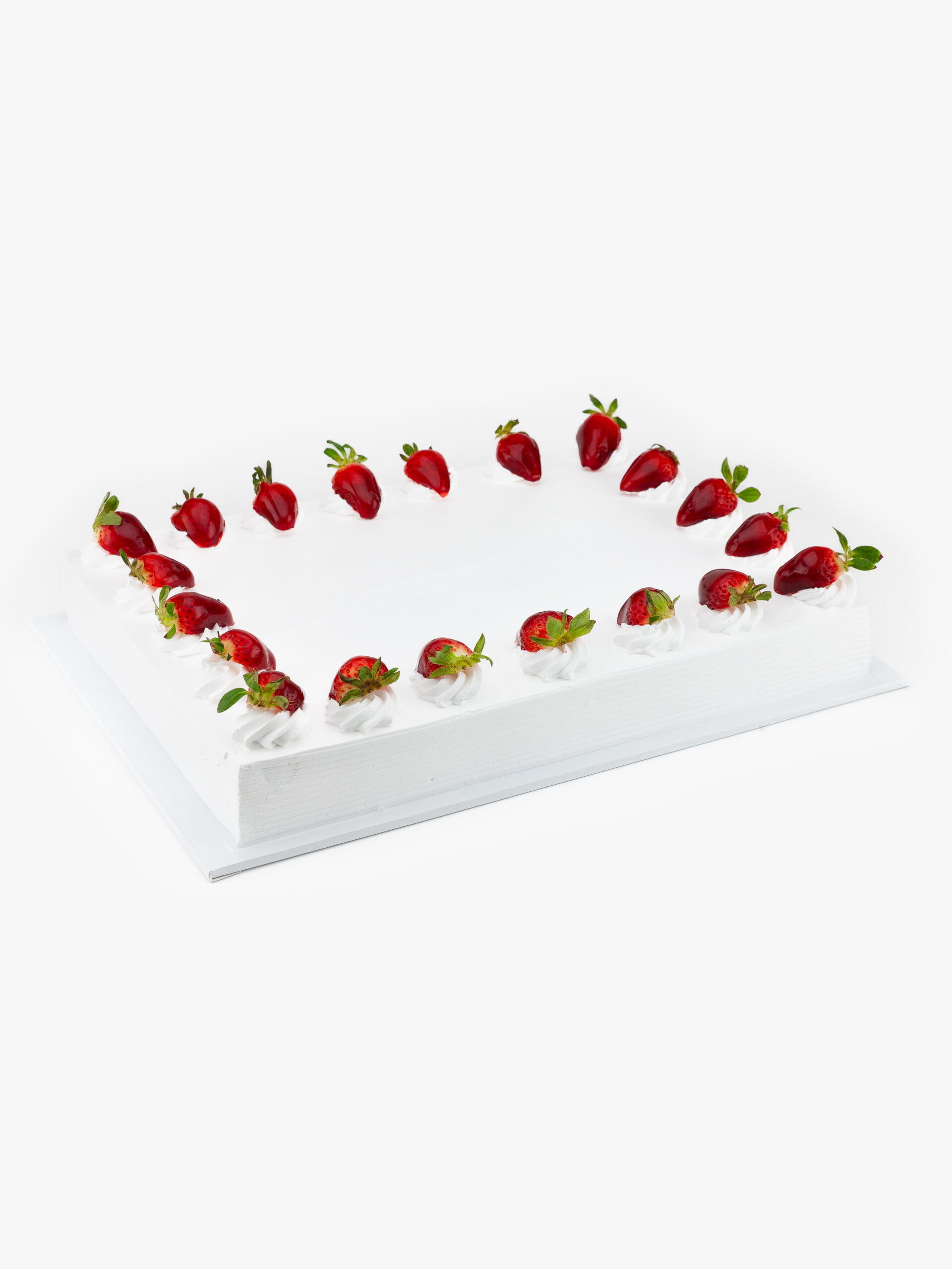 A Single Half Sheet No Cut Tres Leches Specialty Cake decorated with strawberries on a light grey background