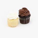 Chocolate and Vanilla Mini Dessert Cupcakes in wrapping on a light grey background