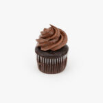 A Single Mini Chocolate Dessert Cupcake in wrapping on a light grey background