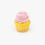 A Single Regular Lemon Raspberry Dessert Cupcake in wrapping on a light grey background