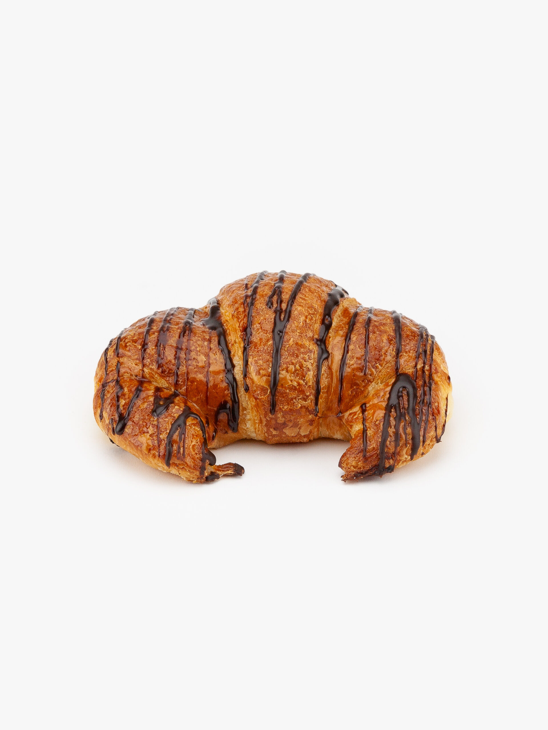 A Single A Single Curved Jumbo Chocolate Breakfast Croissant on a light grey background