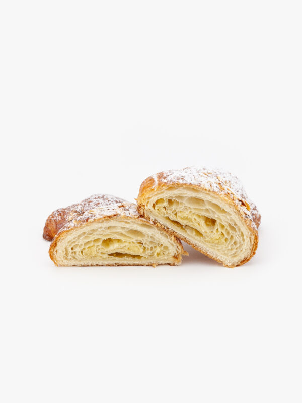 A Single A Single Curved Jumbo Almond Breakfast Croissant Cut Open on a light grey background