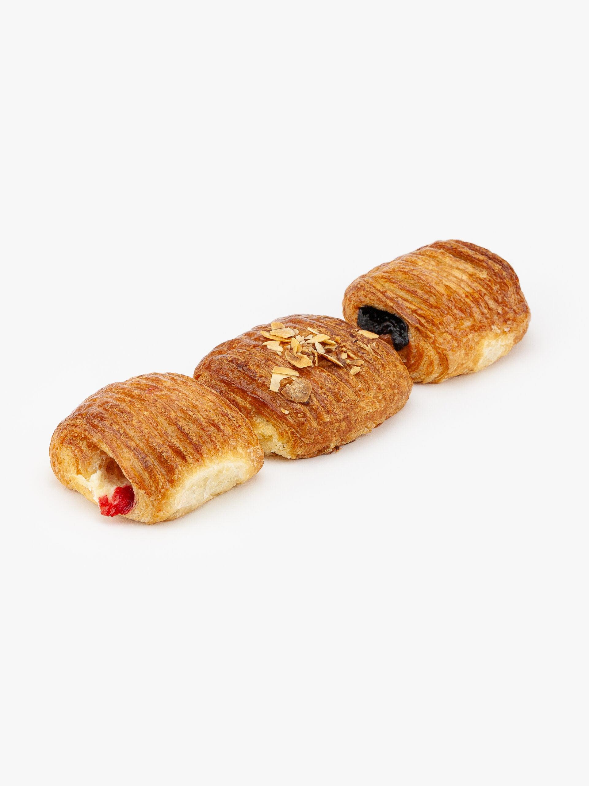 A Selection of 3 Rectangular Mini Assorted Croissants, Guava Cheese, Almond and Chocolate on a light grey background