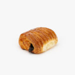 A Single Rectangular Mini Chocolate Croissant perfectly baked on a light grey background