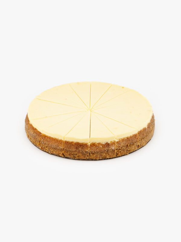 A Single 10" Round New York 16 Cut Cheesecake individually sectioned on a light grey background