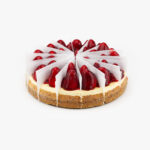 A Single 10" Round Fresh Strawberry 16 Cut Cheesecake individually sectioned on a light grey background