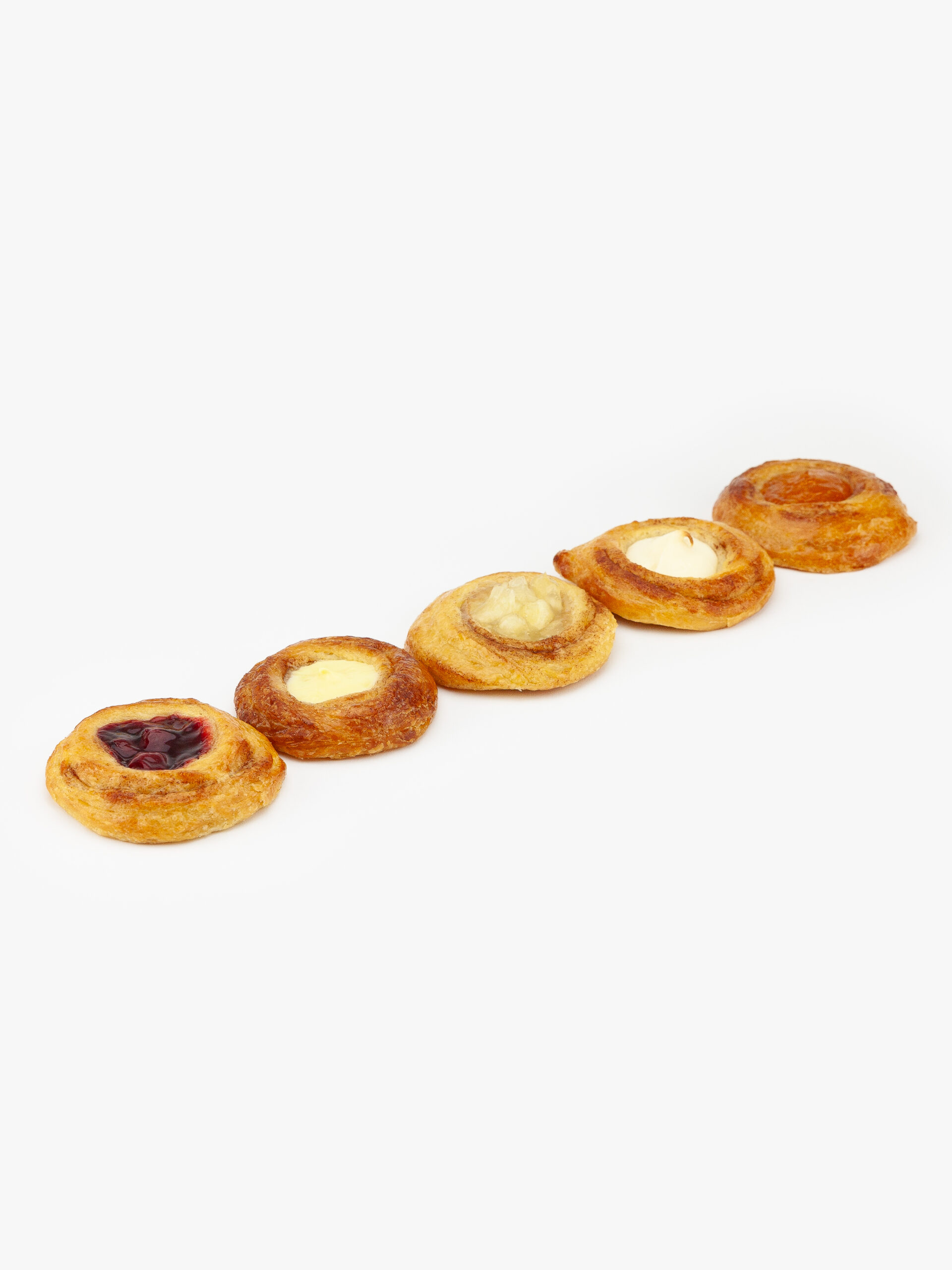 5 Mini Round Assorted Breakfast Danish perfectly baked on a light grey background