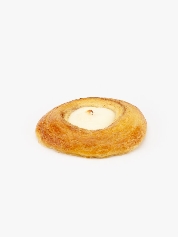 A Jumbo Round Cheese Breakfast Danish perfectly baked on a light grey background