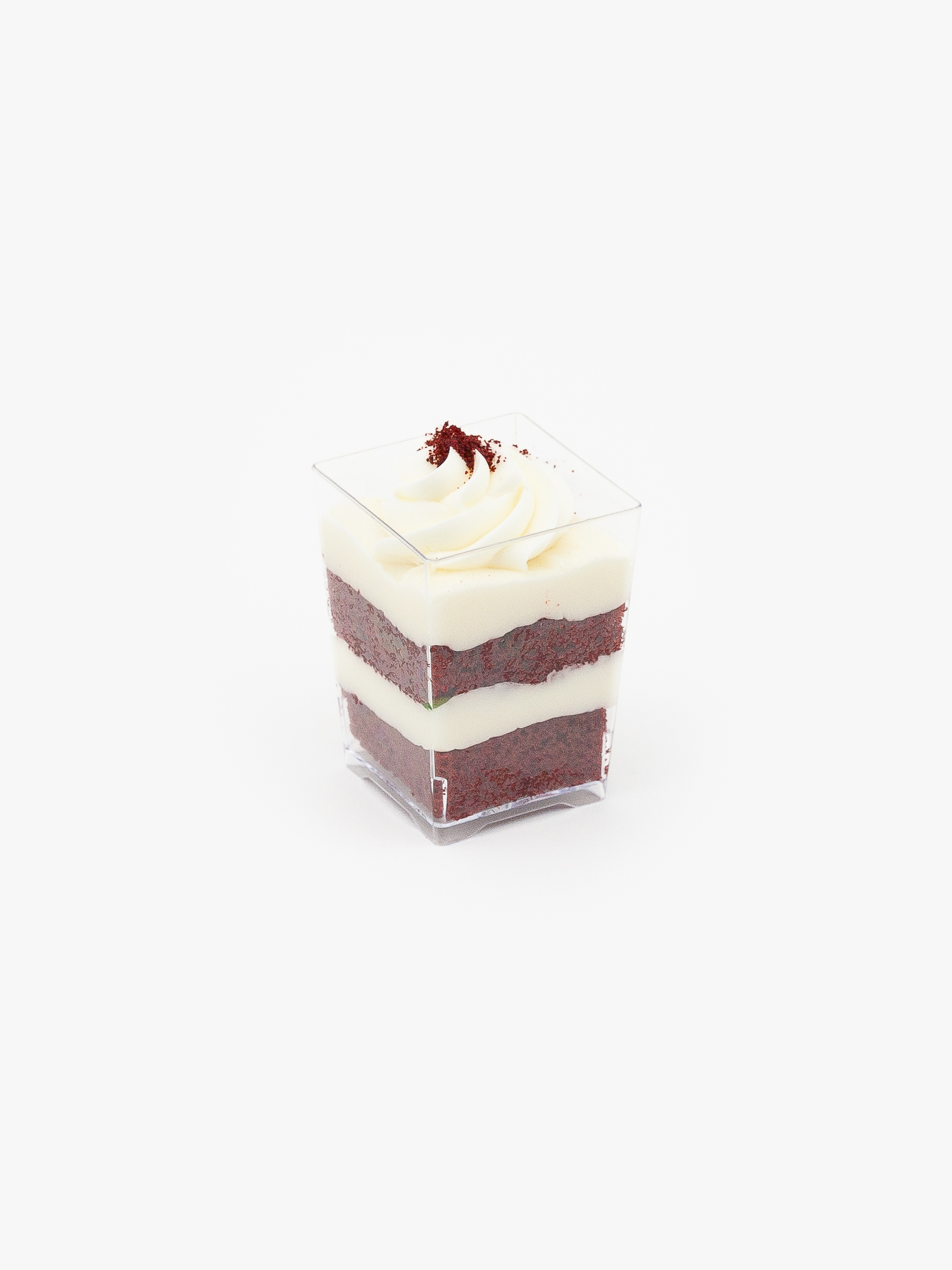 A Single Regular Red Velvet Dessert Parfait Cup on a light grey background