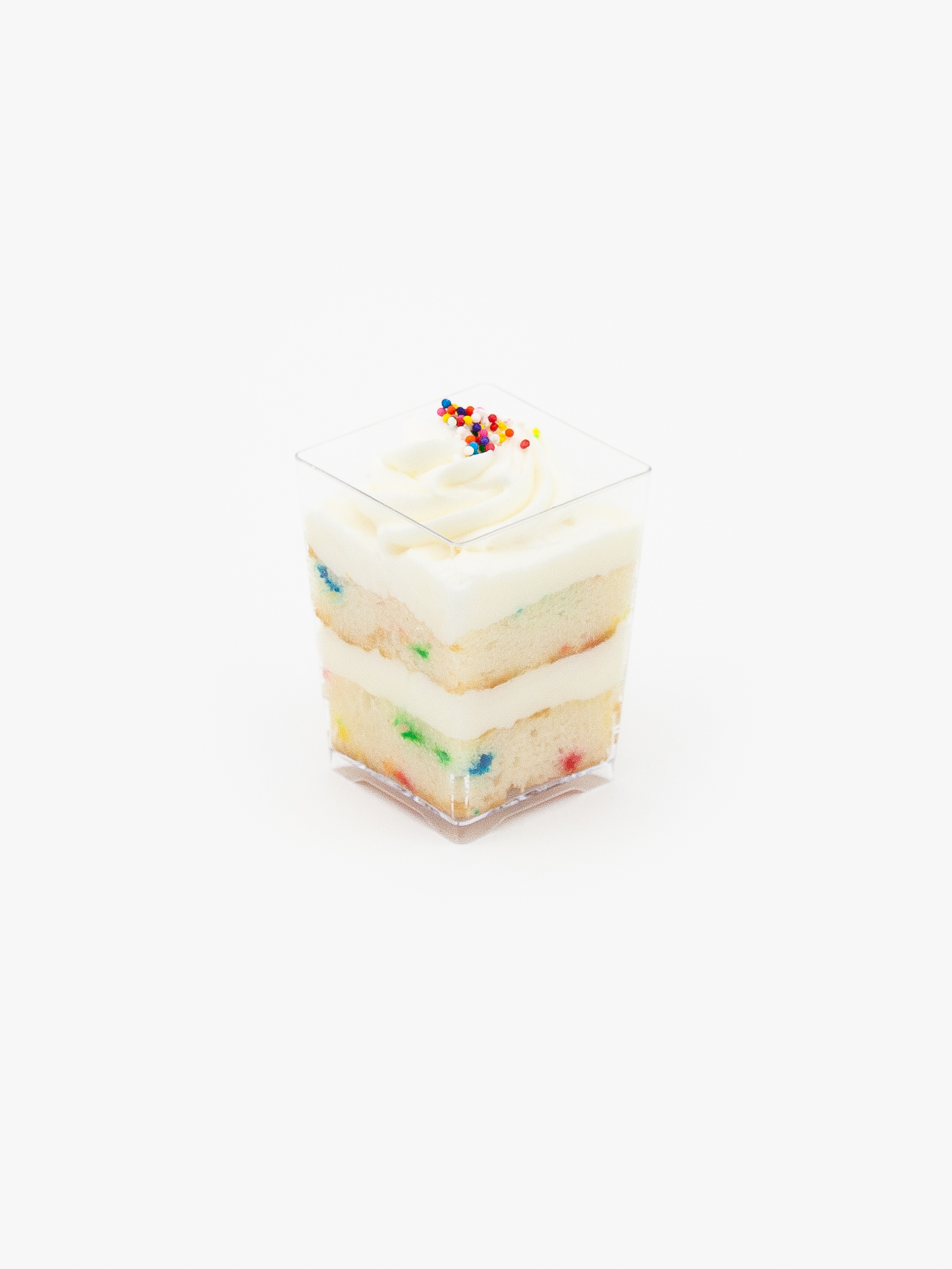 A Single Regular Confetti Dessert Parfait Cup on a light grey background