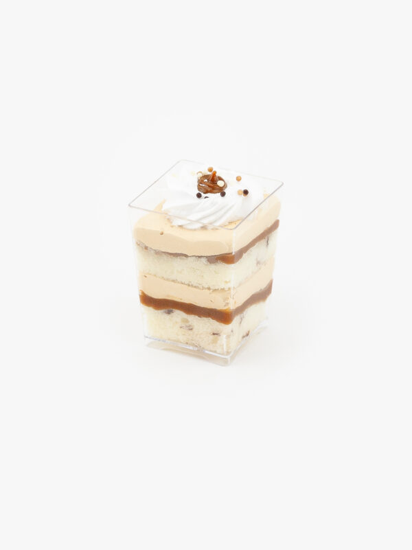 A Single Regular Dulce De Leche Dessert Parfait Cup on a light grey background