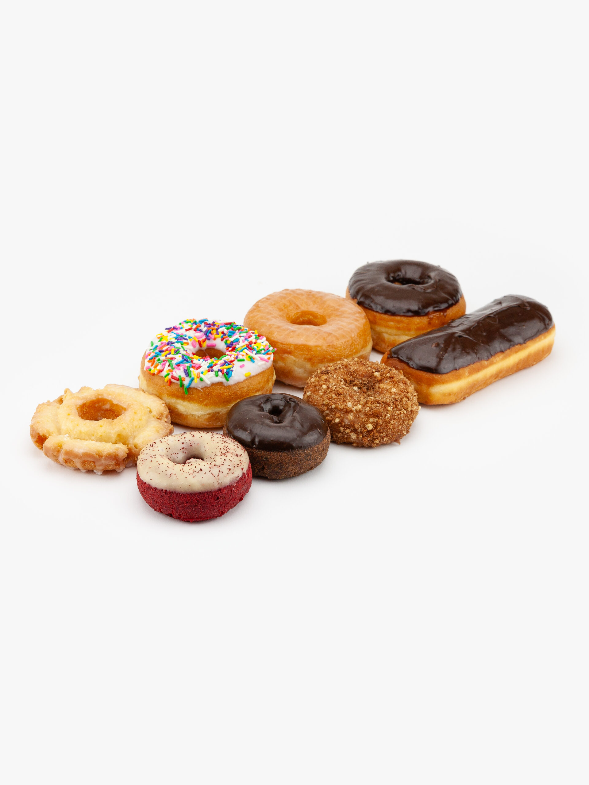 An assortment of 8 regular classic donuts