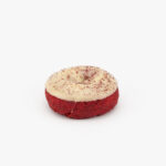 A Regular Red Velvet Cake Donut on a light grey background