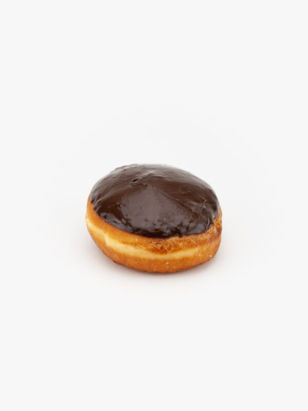 A Regular Cream Filled Donut with Chocolate Glaze on light grey background