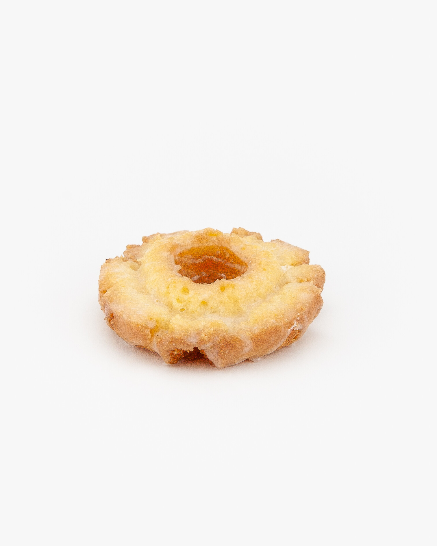 An Old Fashion Glazed Regular Donut on a light grey background