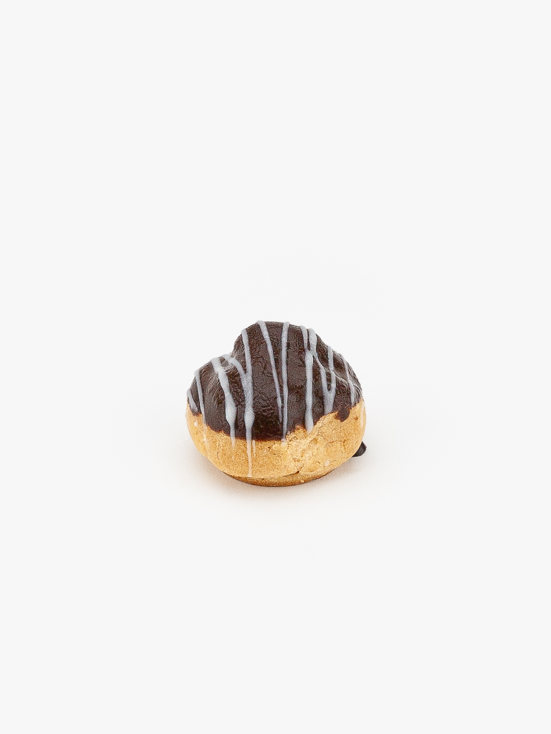 A Mini Cream Puff Dessert Pastry on a light grey background