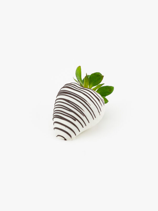 A Single White Chocolate Dipped Strawberry Dessert Pastry on a light grey background