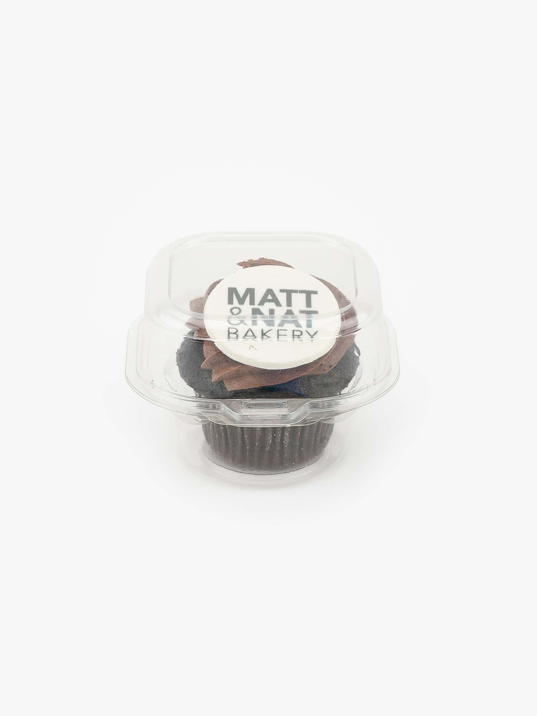 A Single Individual Wrapped Cupcake Container on a light grey background