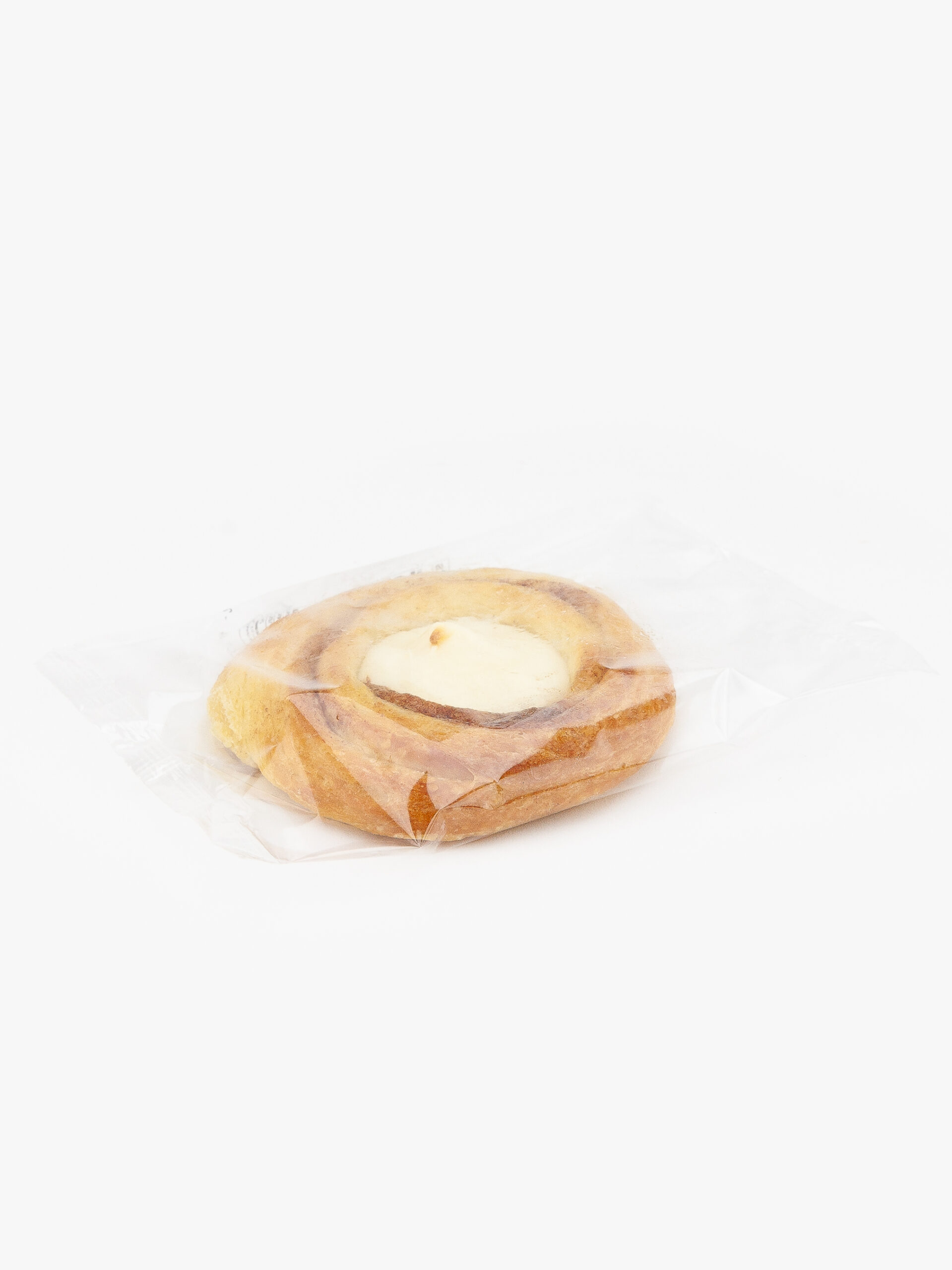 A Single Individual Wrapped Jumbo Cheese Danish Sealed in Plastic on a light grey background