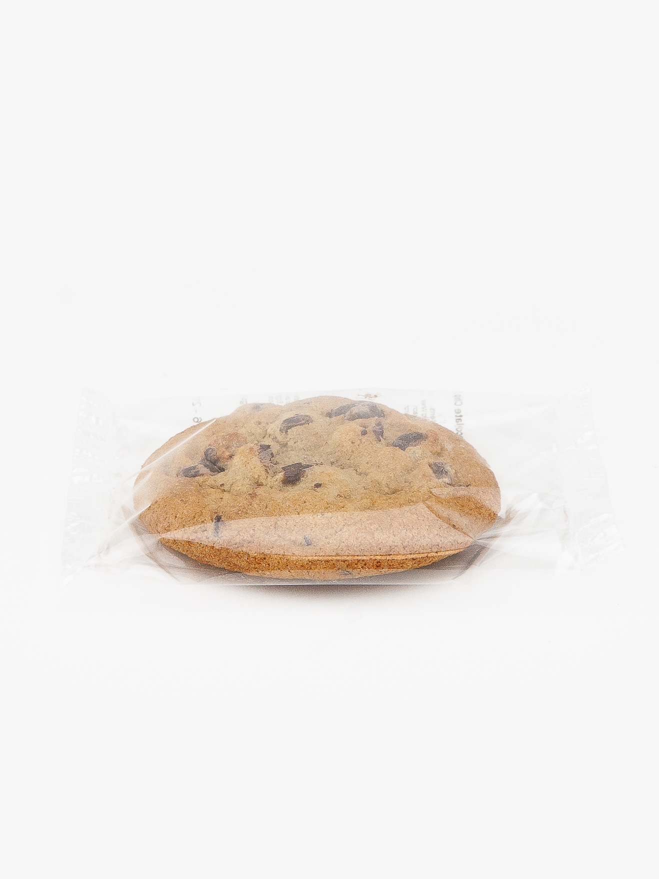 A Single Individual Wrapped Chocolate Cookie Sealed in Plastic on a light grey background