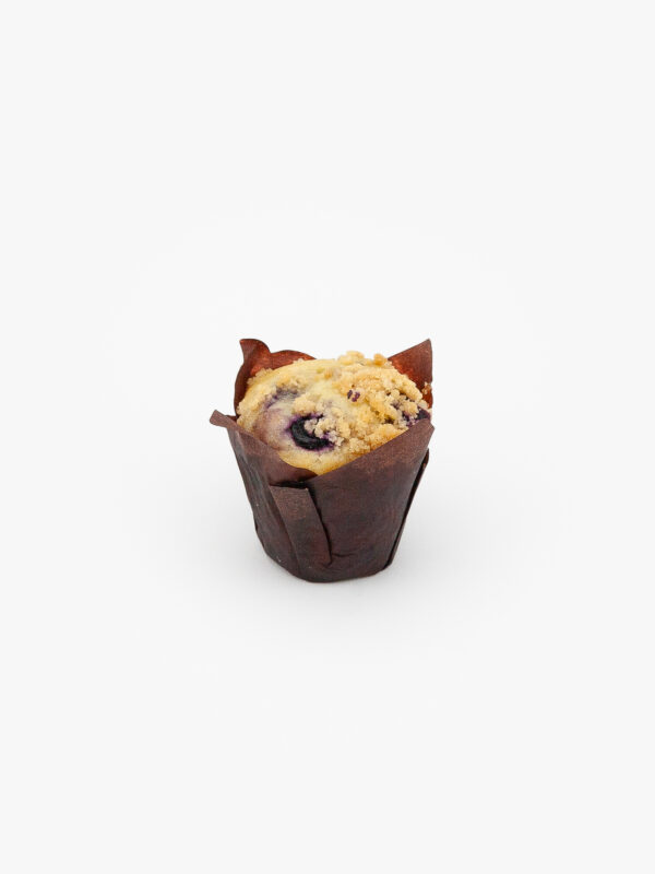 A single Blueberry mini muffin in paper wrapping