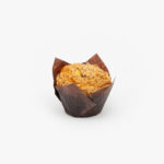 A single Cranberry Orange jumbo muffin in paper wrapping