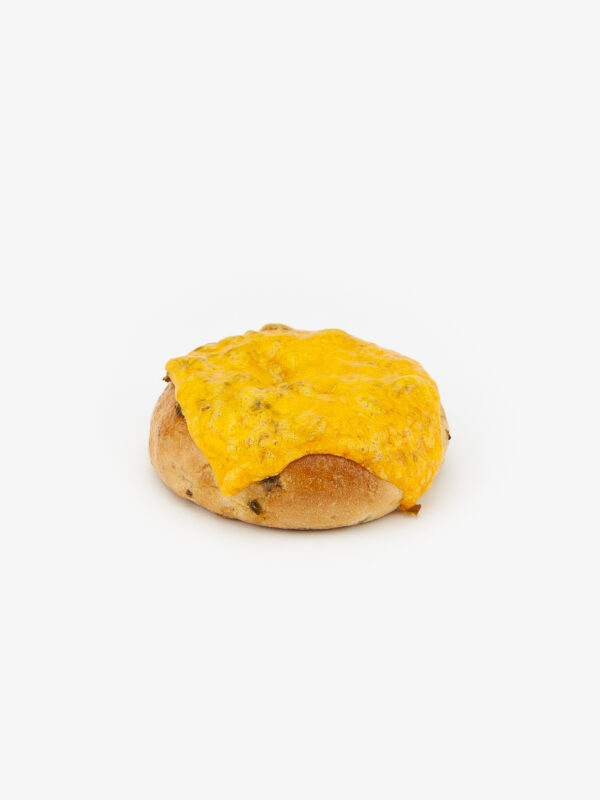 A 3 oz. Jalapeno Cheese Bagel No Slice on a grey background.