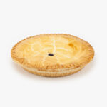 A 10" Baked Blueberry Pie no cut on a light grey background