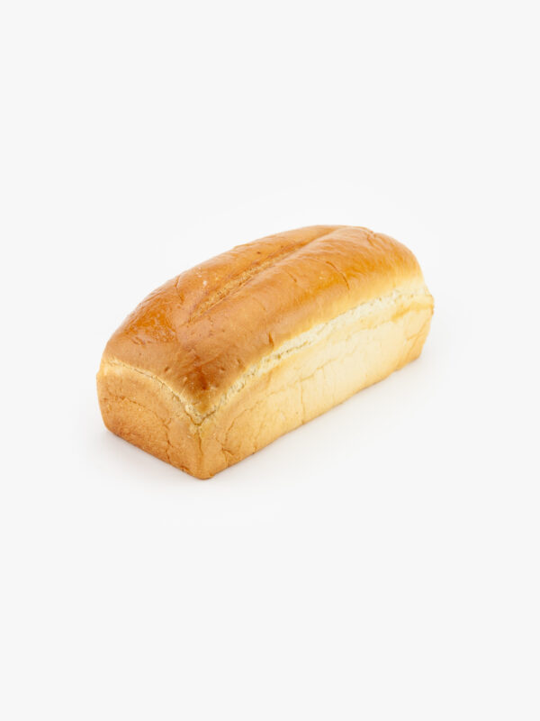 Loaf of 32 oz. Brioche Sandwich bread no slice on a light grey background