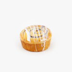 A Jumbo Cinnamon Breakfast Sweet Roll on a light grey background