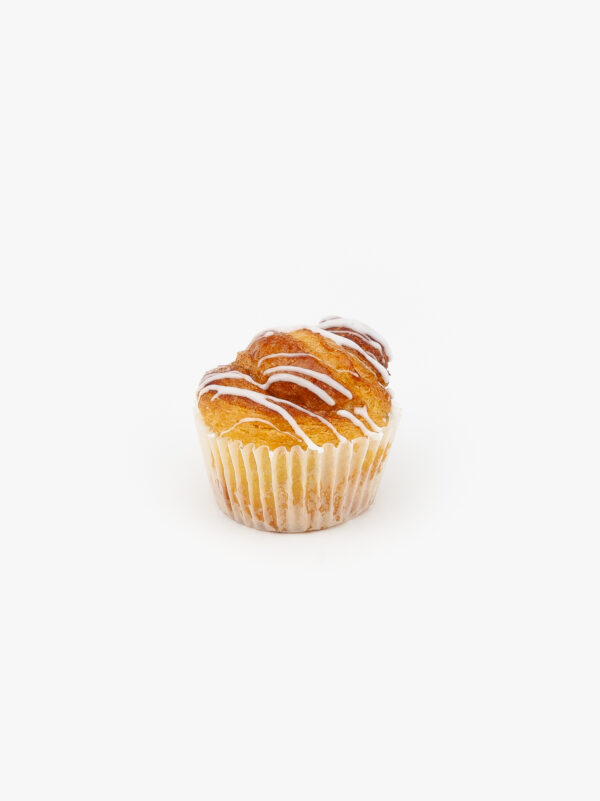 A Mini Cinnamon Breakfast Sweet Roll on a light grey background