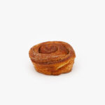 A Jumbo Morning Breakfast Sweet Roll on a light grey background